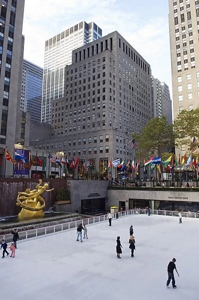 Ice skaters on the rink at the Rockefeller