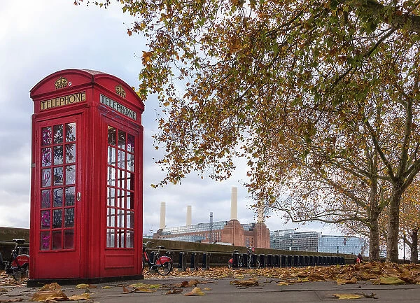 The iconic red telephone box with Battersea Power Station in the background, Chelsea, London, England