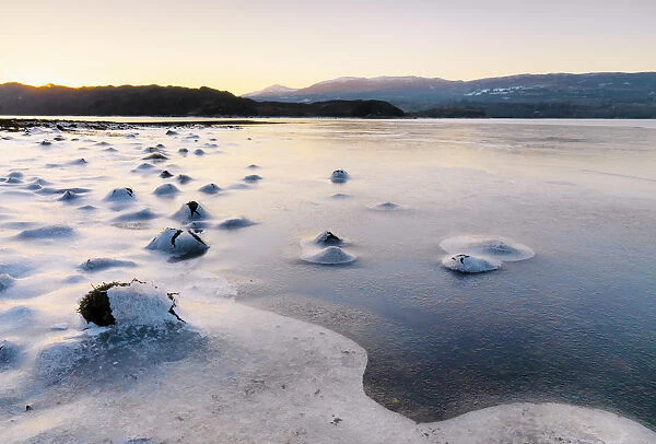 Ireland, Co. Donegal, Mulroy bay frozen at dusk