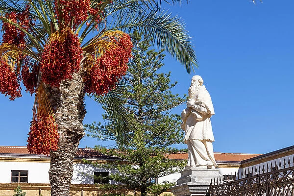 Italy, Sicily, Cefalu, statue of a bishop in front of Cefalu cathedral
