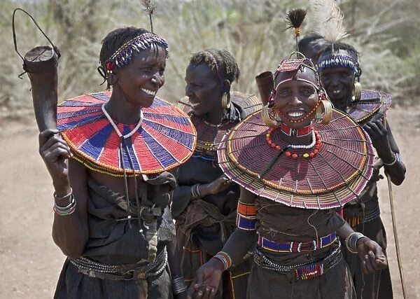 Jovial Pokot women celebrate an Atelo ceremony. The Pokot are pastoralists speaking a Southern Nilotic