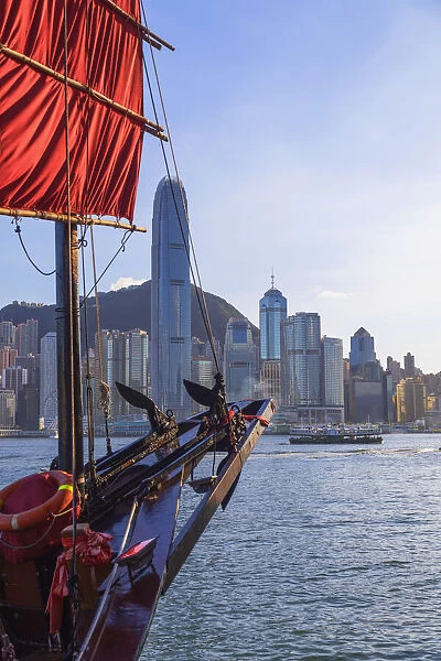 Junk boat and skyline of Hong Kong Island, Hong Kong