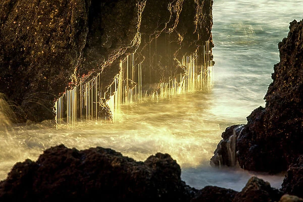 Light Catching Water Dripping from Rocks, Ponta da Piedade, near Lagos, Algarve, Portugal