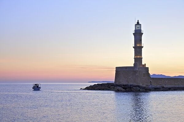 The Lighthouse and Fishing Boat in The Venetian Harbour at Sunrise, Chania, Crete