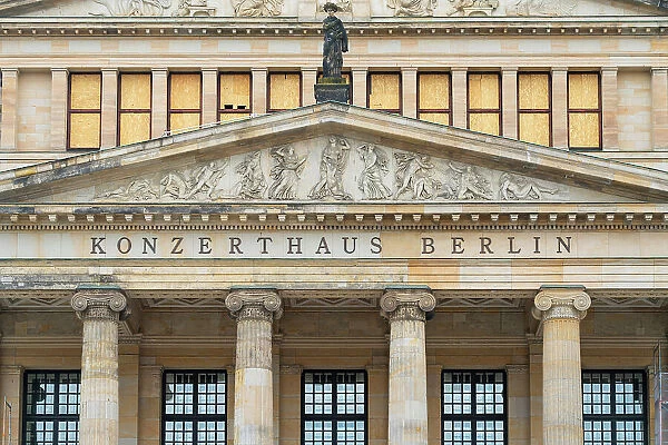 Low angle view of statue on Konzerthaus Berlin, Gendarmenmarkt square, Mitte, Berlin, Germany