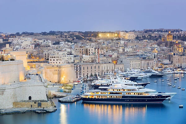 Malta, South Eastern Region, Valletta. Birgu Marina at dusk