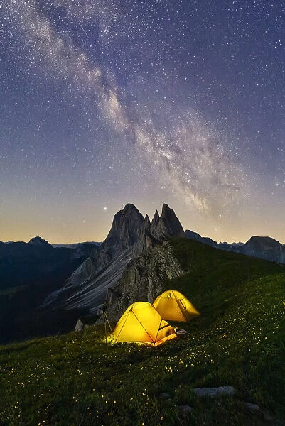 Milky way and tents over Grosse Fermeda at Seceda, Gruppo delle Odle, Dolomiti di Gardena