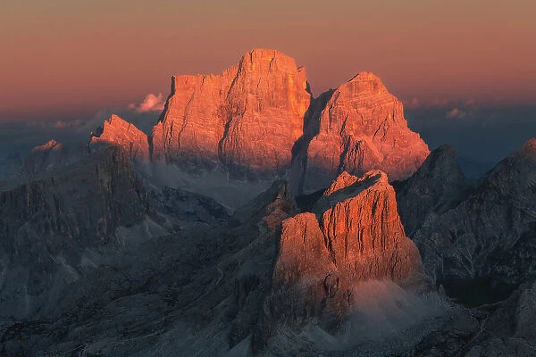 Mt. Pelmo capturing the last light of the day, seen from the Lagazuoi Hut on a summer evening. Dolomites, Italy