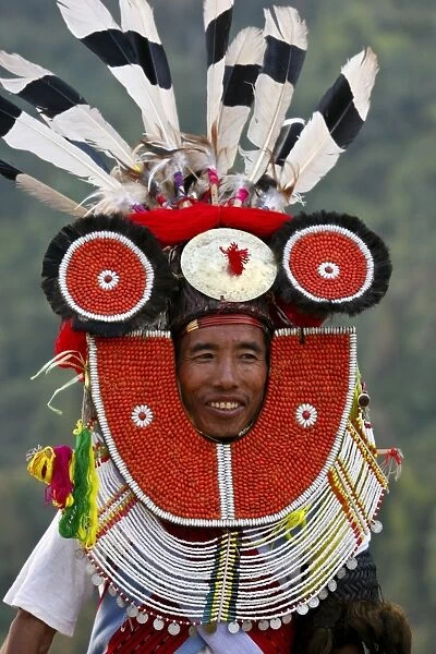 Myanmar, Burma, Naga Hills. A Tangkhul Naga in his ceremonial finery celebrating the Naga New Year Festival (Kaing Bi) in