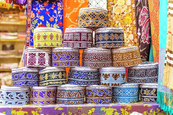 Oman, Muscat. Souvenirs for sale at a shop in the old souk of Mutrah