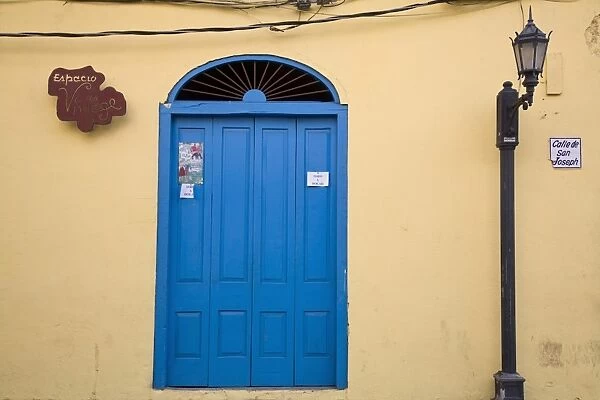 Panama, Panama City, Casco Viejo (San Felipe), Lamp-post by blue door