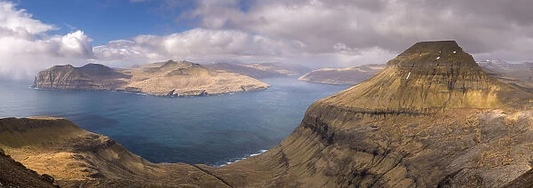 Panoramic vista of Skaelingur mountain, Vagafjordur and Vestmannasund from Sornfelli on the island of Streymoy, Faroe Islands, Denmark, Europe. Spring (April) 2016