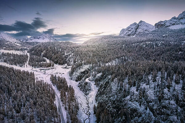 Passo Tre Croci, Dolomites, Veneto, Italy. Aerial show of the Dolomites mountain range in a frozen sunrise