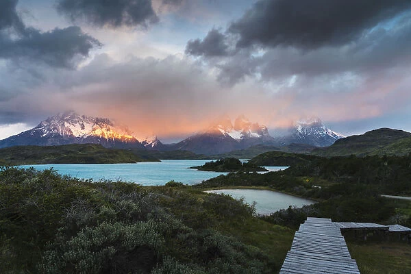 Pehoa Lake with Cerro Paine Grande, Paine Horns and Cerro Paine covered in mist at dawn