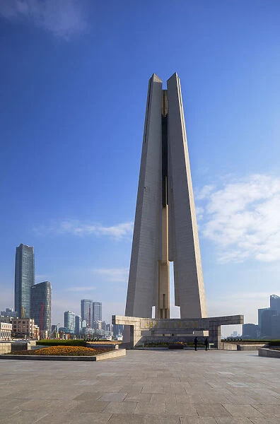 Peoples Heroes Memorial Tower and buildings along Huangpu River, Shanghai, China