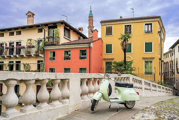 Piaggio Vespa scooter parked in the old town, Vicenza, Veneto, Italy