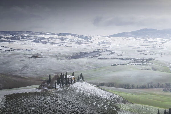 Podere Belvedere covered in snow during a rare winter blizzard in Val d Orcia