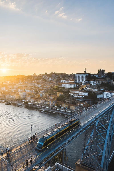 Portugal, Norte region, Porto (Oporto). Dom Luis I bridge and Douro river at sunset
