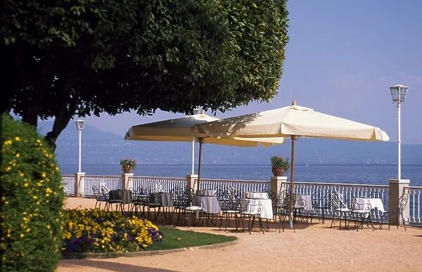 Promenade at Gardone Riviera with tables and chairs