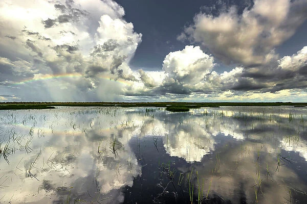 Rainbow over Swim Creek floodplain, Bamurru Plains, Northern Territory, Australia