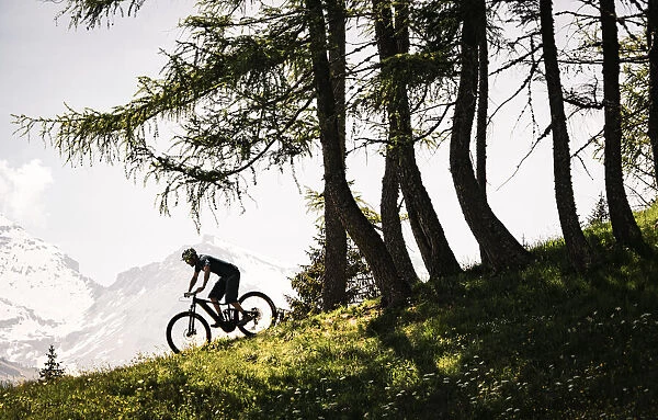 Riding on the ridge in Motta, Spluga valley, Lombardy region, Italy