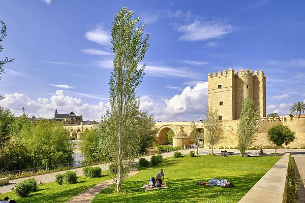 The Roman Bridge (Puente Romano) over Guadalquivir River and the Calahorra Tower, a fortified gate. A UNESCO World Heritage Site, Cordoba. Andalucia, Spain