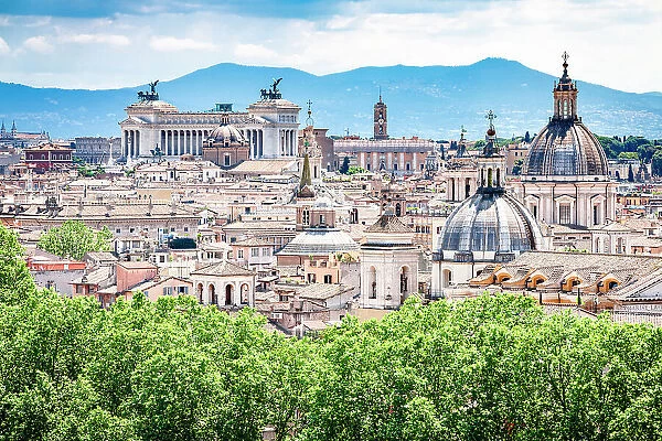 Rome skyline with domes of catholic churches and Altare Della Patria or Vittoriano, Rome, Lazio, Italy