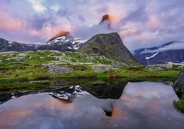 Romsdal horn reflected itself in a little lake at sunset, Andalsnes, More og Romsdal county, Norway