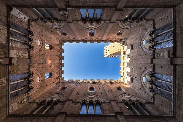 Siena, Tuscany, Italy, Europe. Classic bottom view of Palazzo Pubblico with Del Mangia s