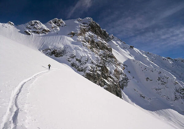 Skier at Sella di Pioda, Monte Disgrazia, Valtellina, Lombardy, Italy
