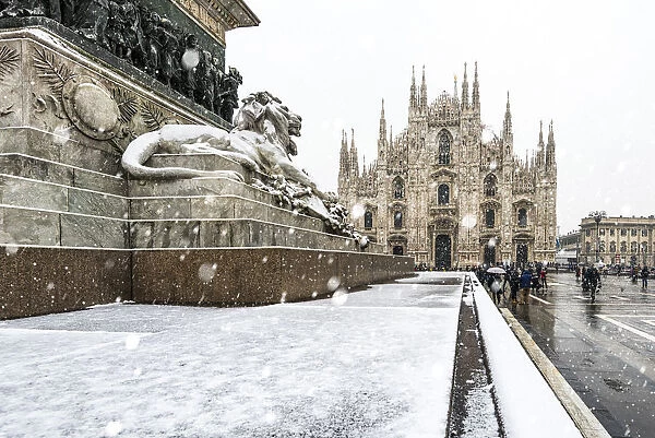 Snowfall over Milan cathedral. Milan, Lombardy, Italy
