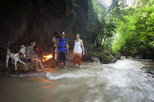 South East Asia, Thailand, North, Mae Hong Son, trekkers enter a river-cut cave with