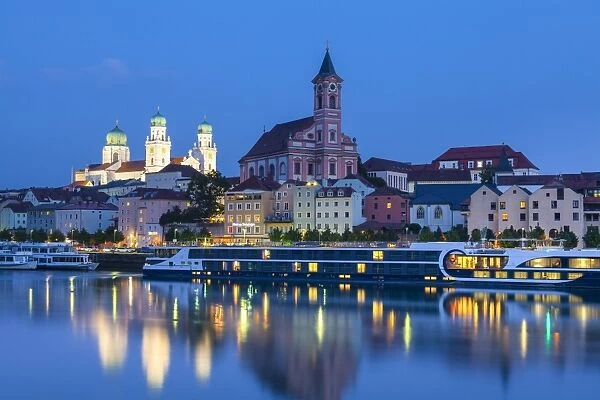 St. Pauls church & St. Stephans Cathedral illuminated at dusk, Passau, Lower Bavaria