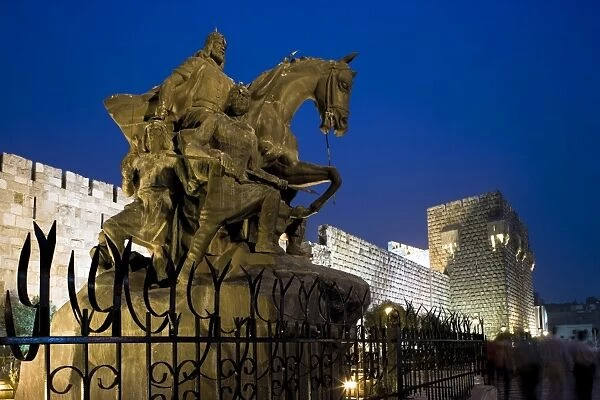 A statue of Saladin stands in front of the citadel