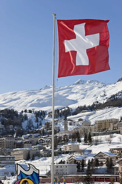 Swiss flag flying, St. Moritz, Upper Engadine, Oberengadin, Graubunden region, Swiss Alps