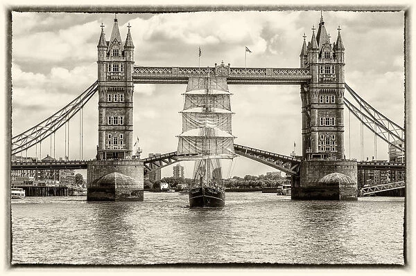 Tall Ship Thalassa passing through the Tower Bridge, London, England