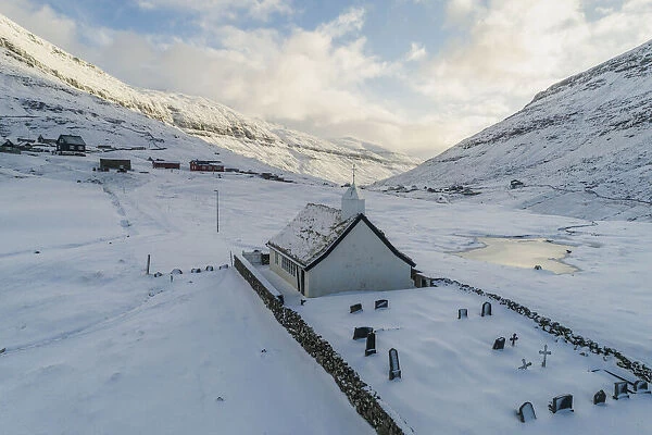 The tiny church in Saksun covered by snow. Streymoy, Faroe Islands