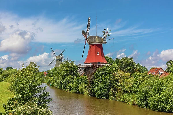 Twin windmills near Greetsiel, East Frisia, Lower Saxony, Germany
