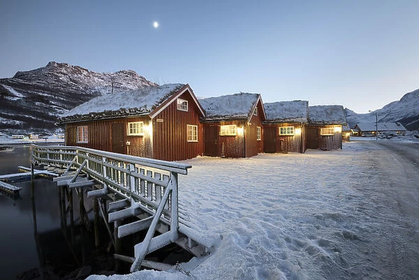 Typical fisherman house during twilight, Lokvoll, Manndalen, Kafjord, Lyngen Alps, Tromso