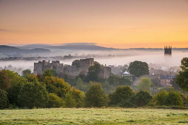 UK, England, Shropshire, Ludlow, Ludlow Castle and St Laurences Church at Sunrise