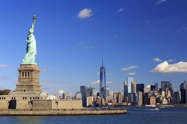 USA, New York, New York City, Statue of Liberty and Lower Manhattan Skyline