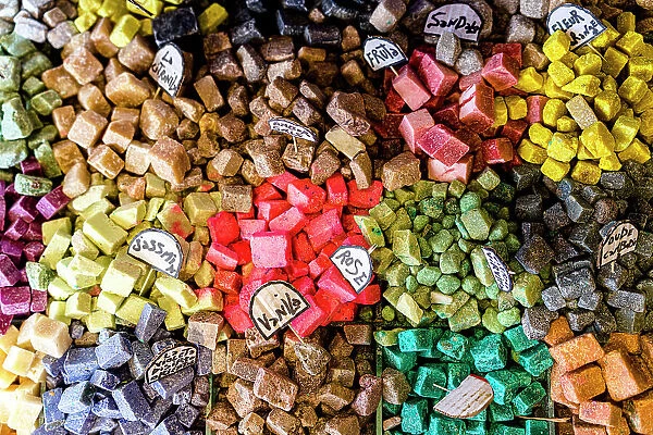 Variety of natural handmade soaps for sale in the souk of medina old town, overhead view, Morocco