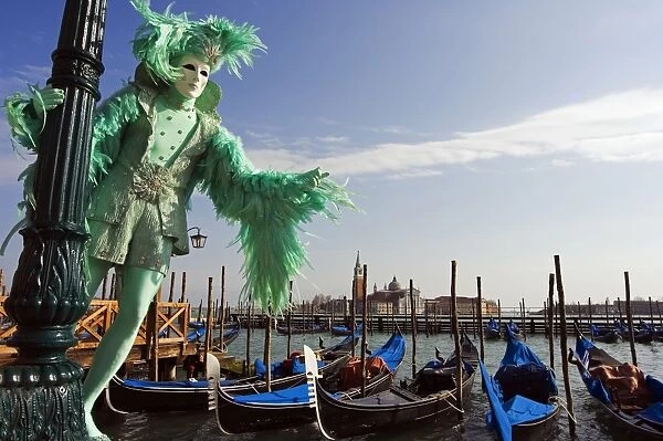 Venice Carnival People in Costumes and Masks on Canal