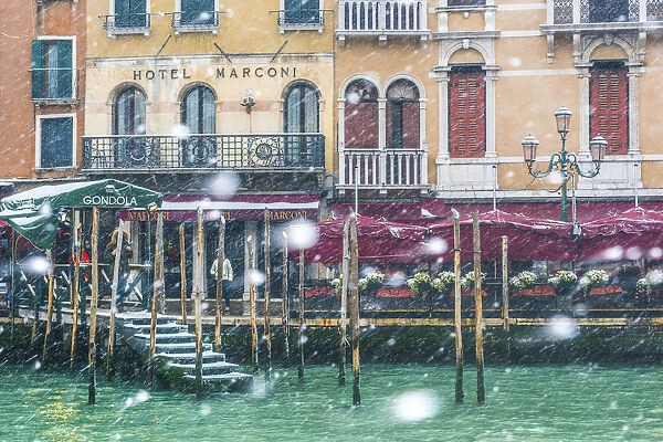 Venice, Veneto, Italy. Snowfall at Grand Canal (Canal Grande)