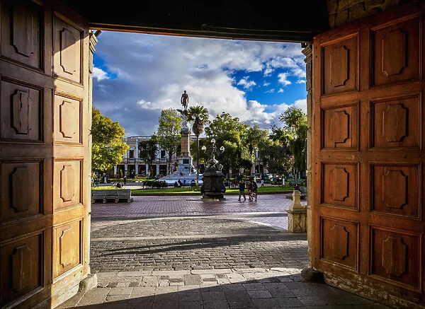 View through the entrance to San Pedro Cathedral towards Maldonado Park, Riobamba