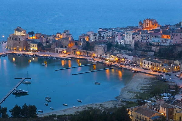View over harbour at dusk, Castellammare del Golfo, Sicily, Italy