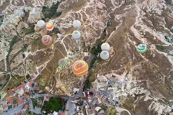 Top down view of hot air balloons over Cavusin village, Avanos District, Nevsehir Province, Cappadocia, Central Anatolia Region, Turkey