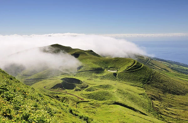 Volcanic craters along the Sao Jorge island viewed from Pico da Esperanca. Azores islands