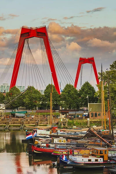 Willemsbrug bridge at sunset with boats in Oudehaven, Holland  /  Netherlands