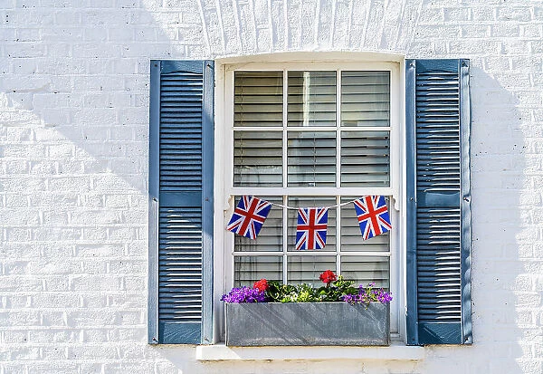 Window, with uinion flags, Kensington, London, England, UK